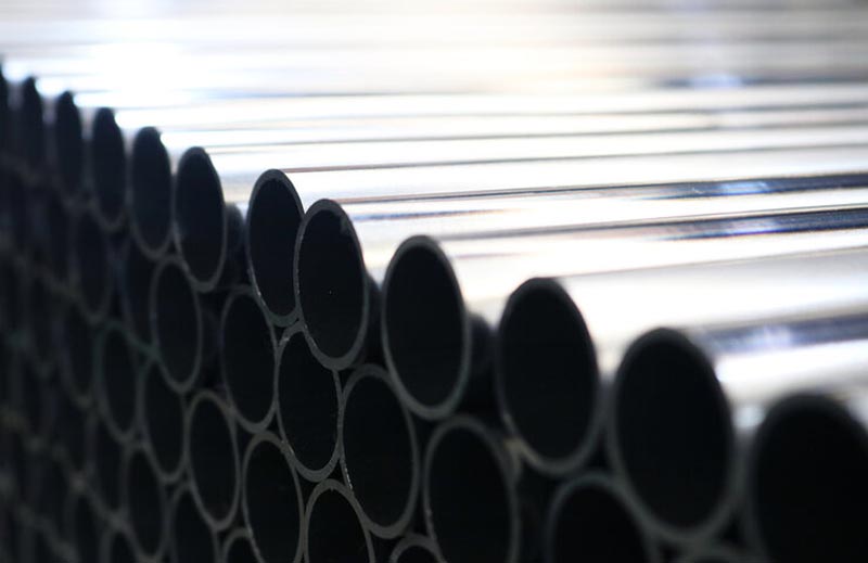 Coated steel pipe and tube